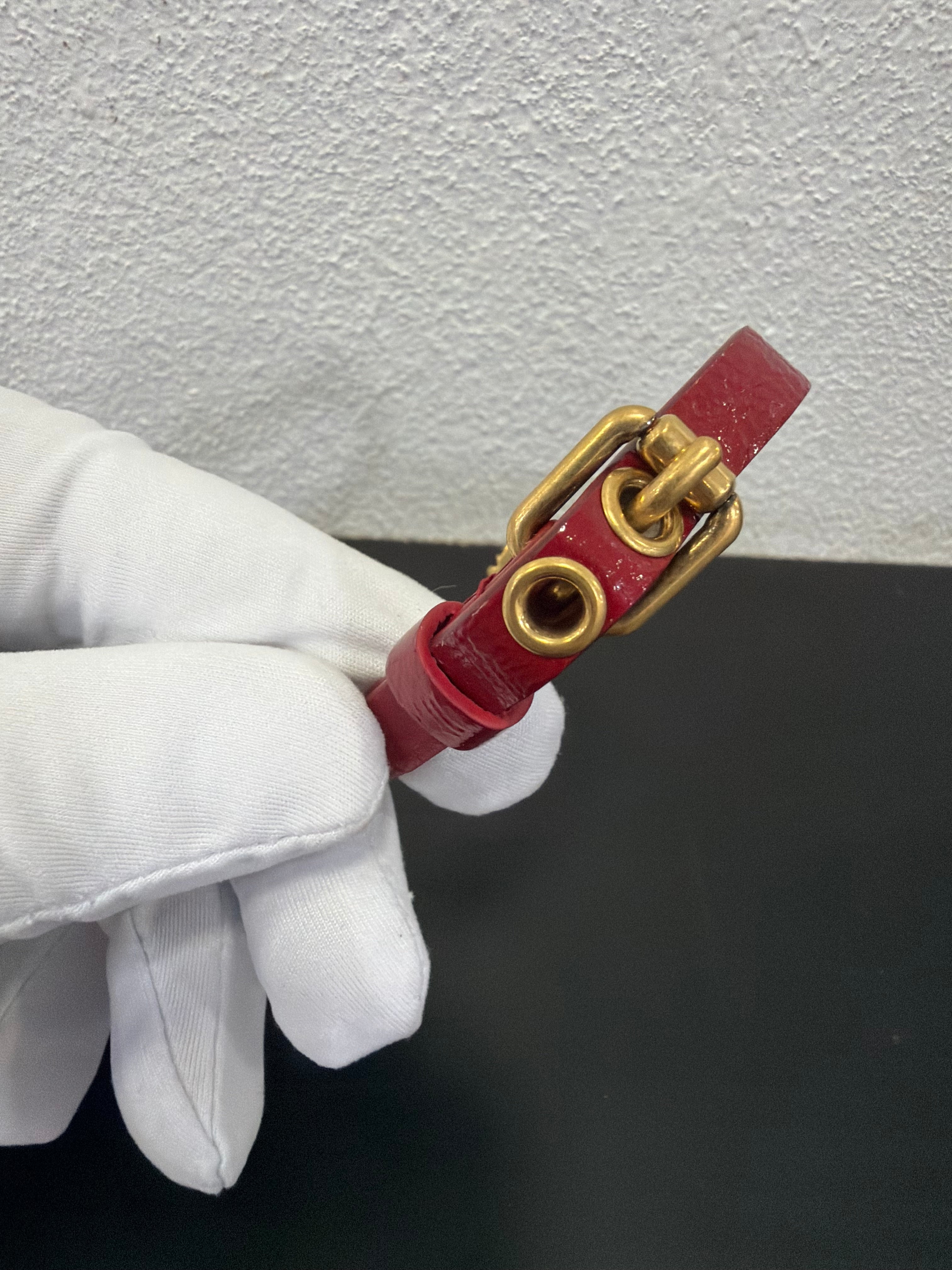 Gucci Bracciale in pelle bordeaux con Leone