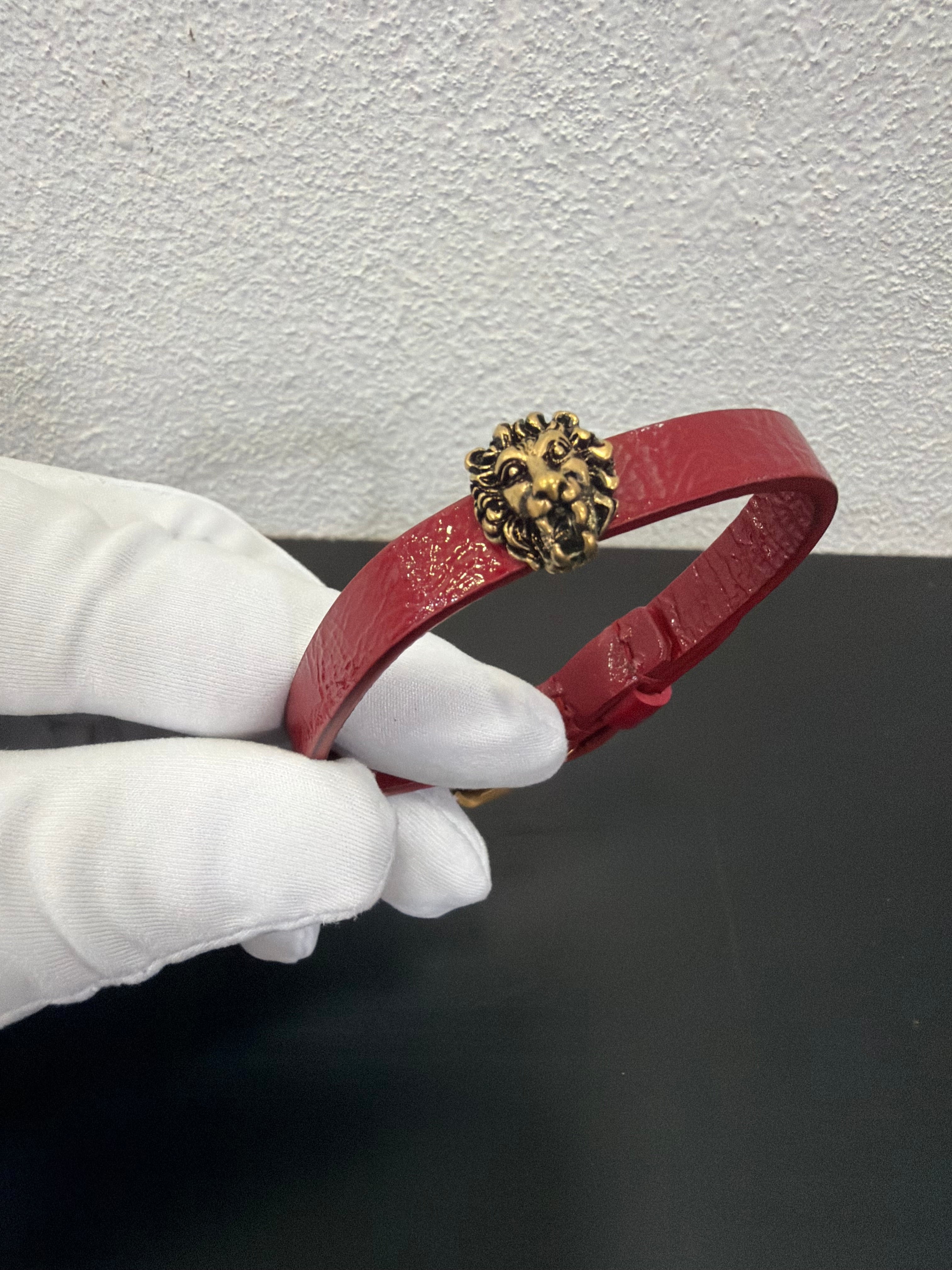 Gucci Bracciale in pelle bordeaux con Leone
