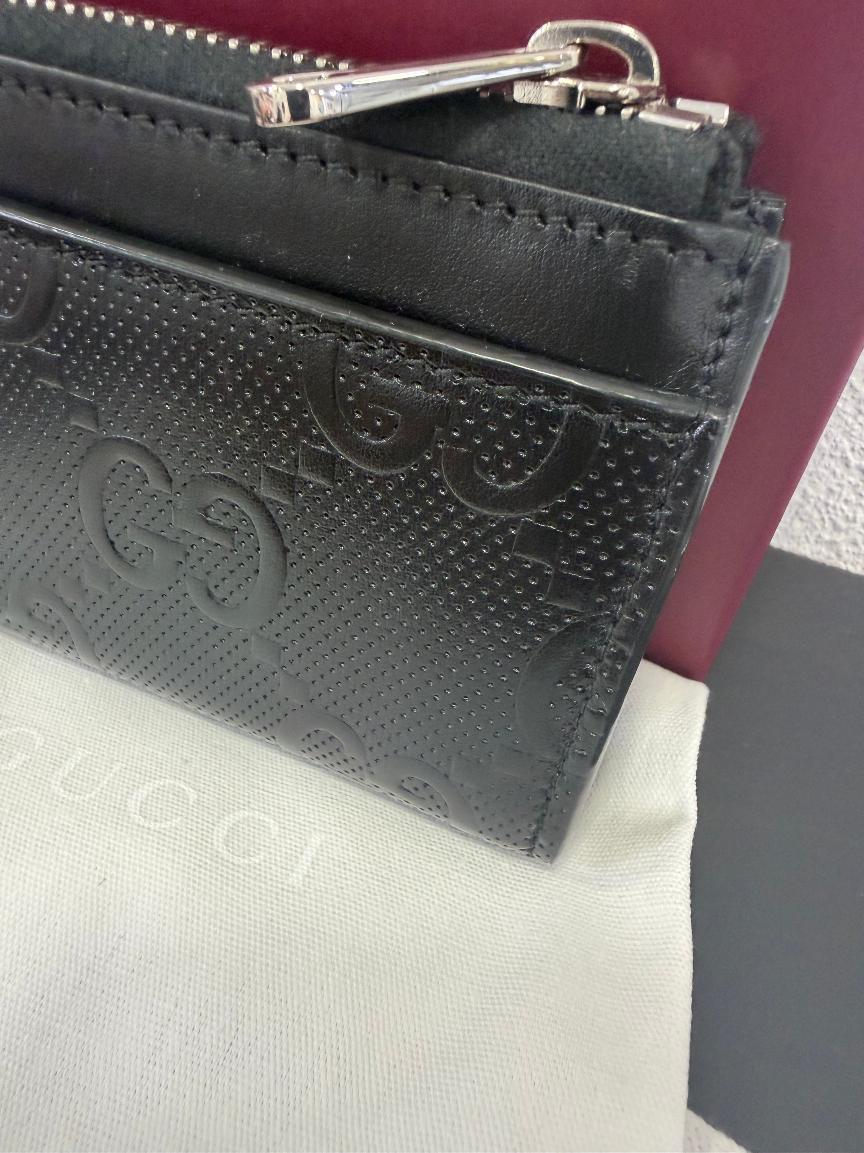 Gucci Portamonete in pelle GG