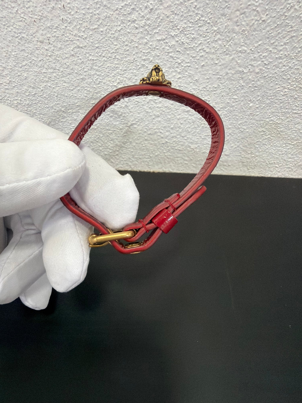 Gucci Bracciale in pelle bordeaux con Leone