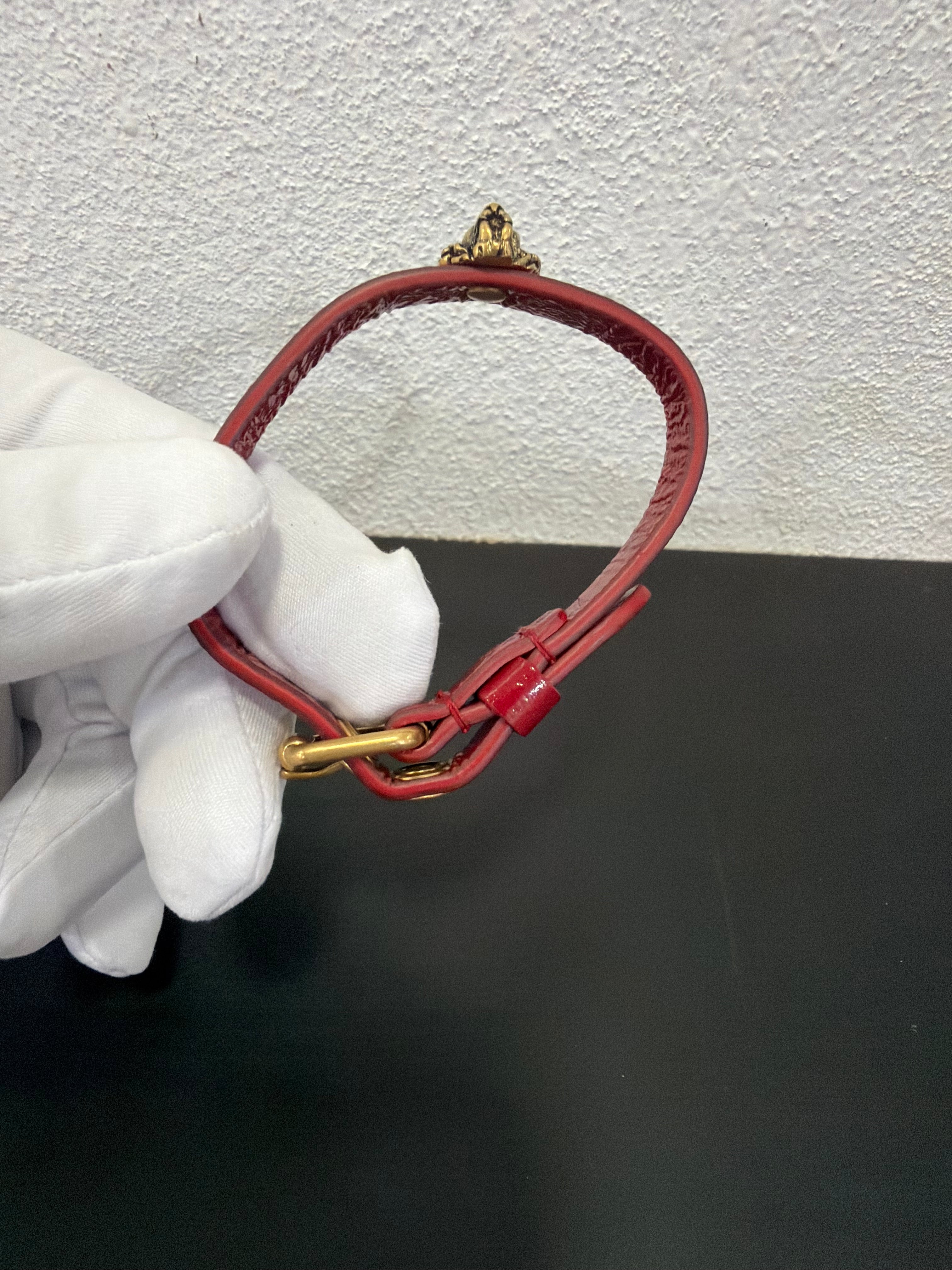 Gucci Bracciale in pelle bordeaux con Leone