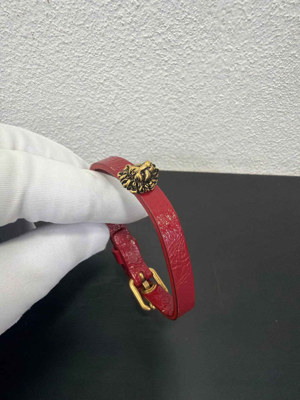 Gucci Bracciale in pelle bordeaux con Leone