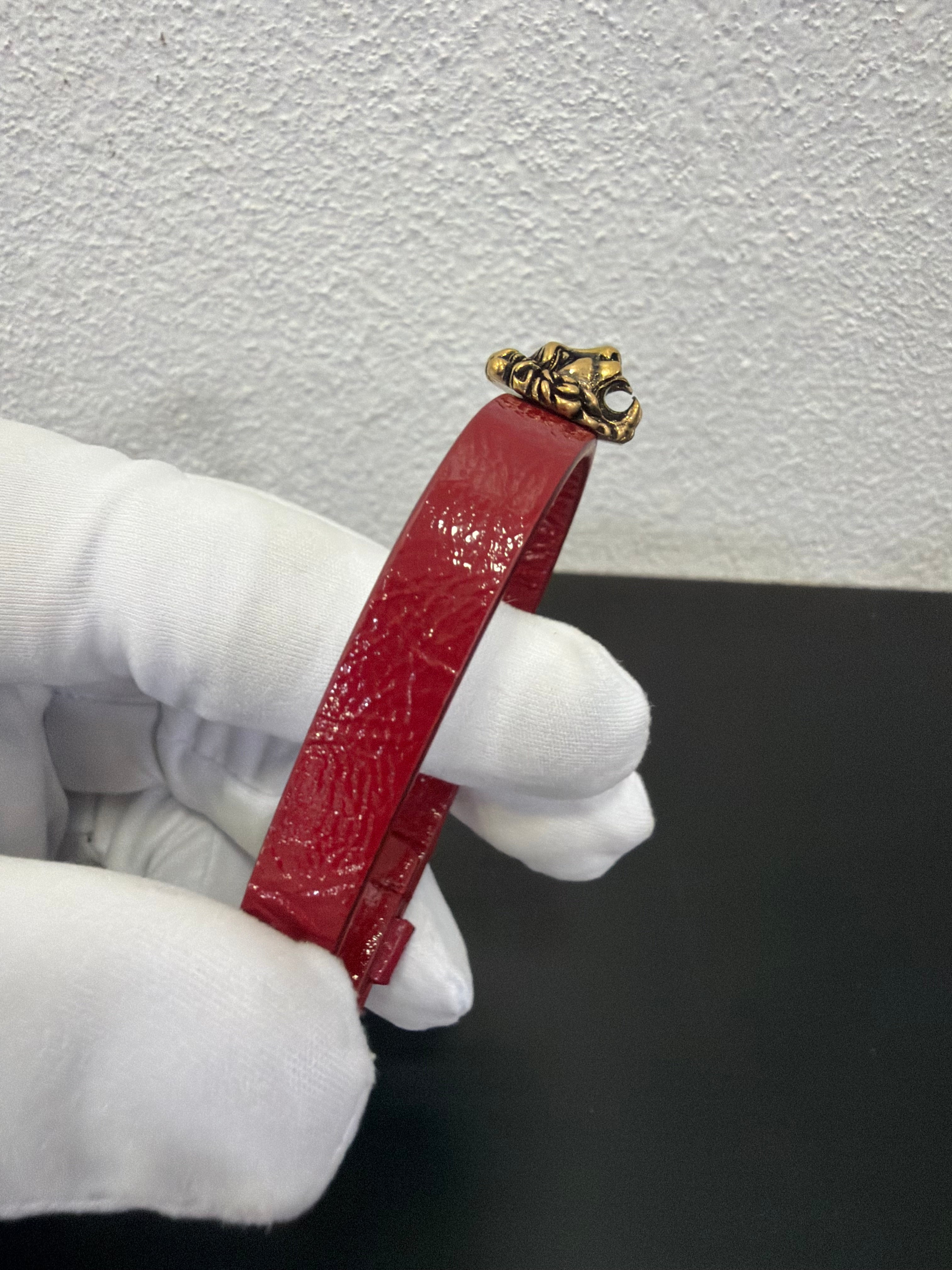 Gucci Bracciale in pelle bordeaux con Leone