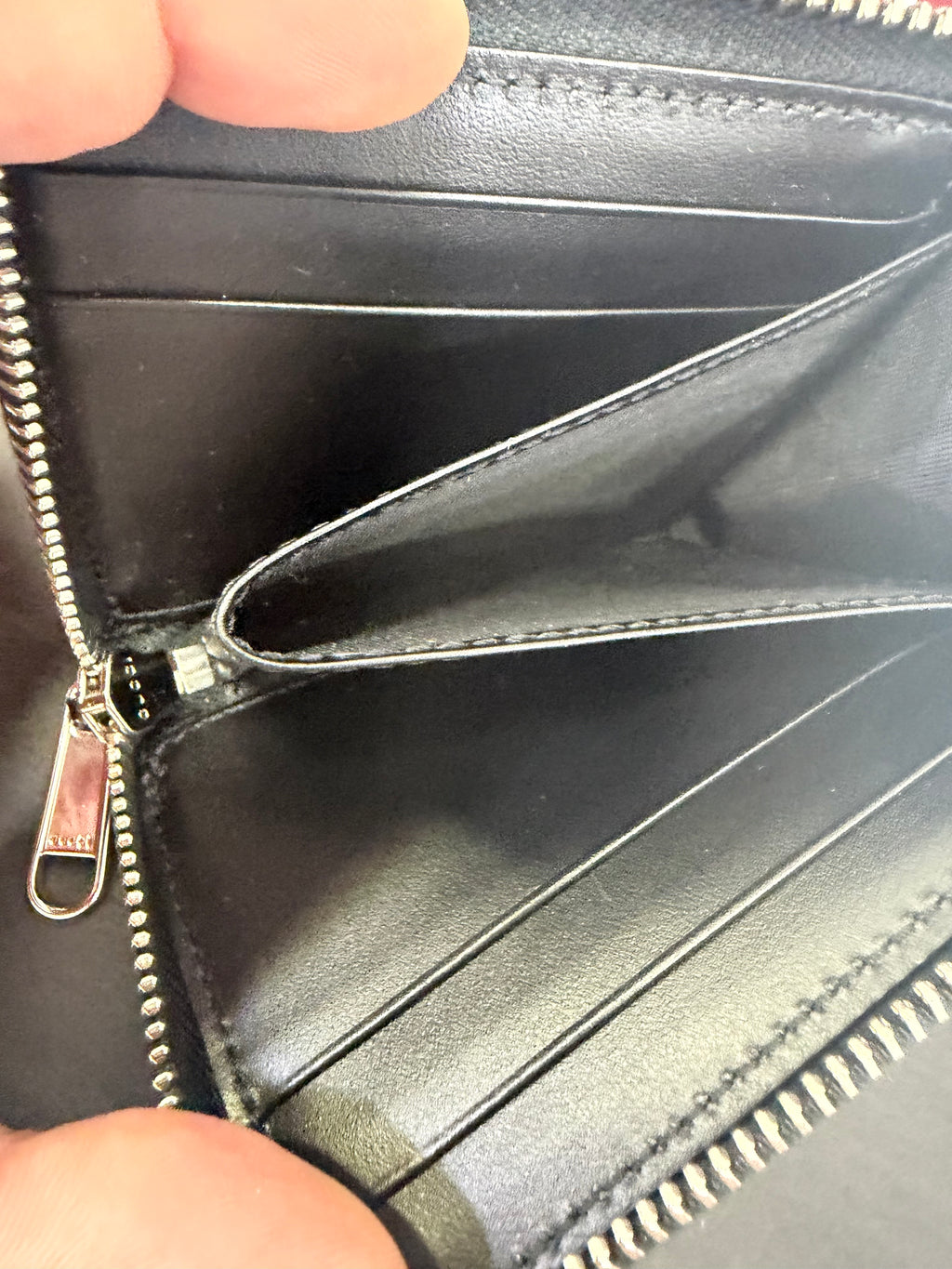 Gucci Portamonete in pelle GG