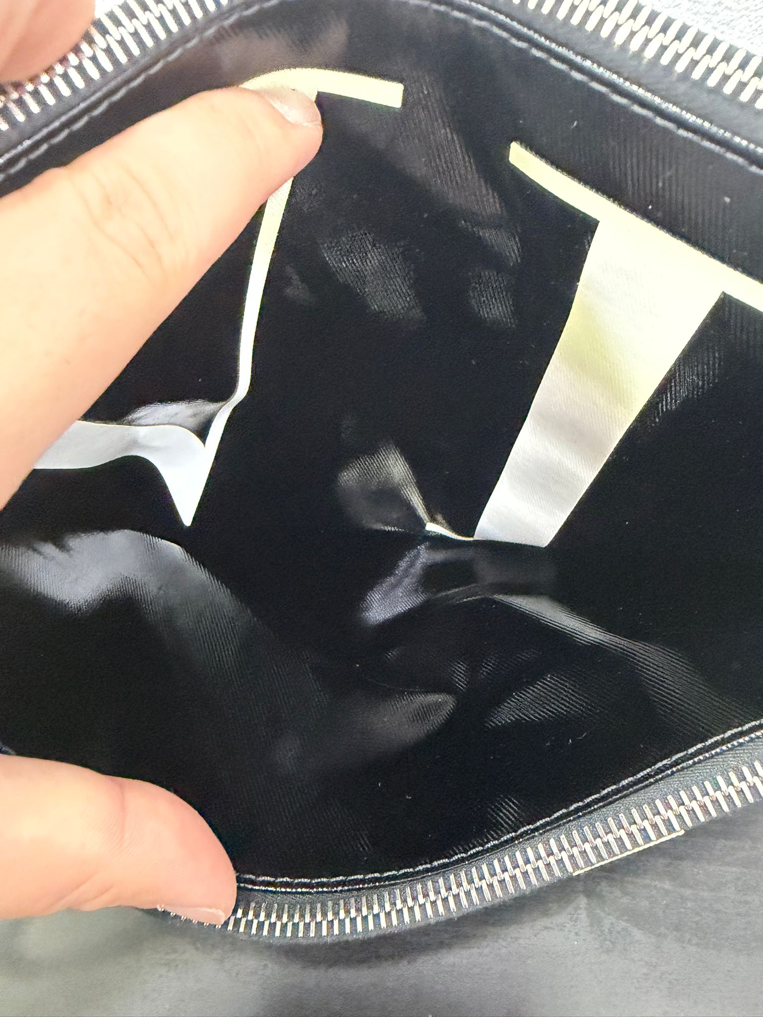 Valentino Garavani Pochette in pelle lucida con Logo