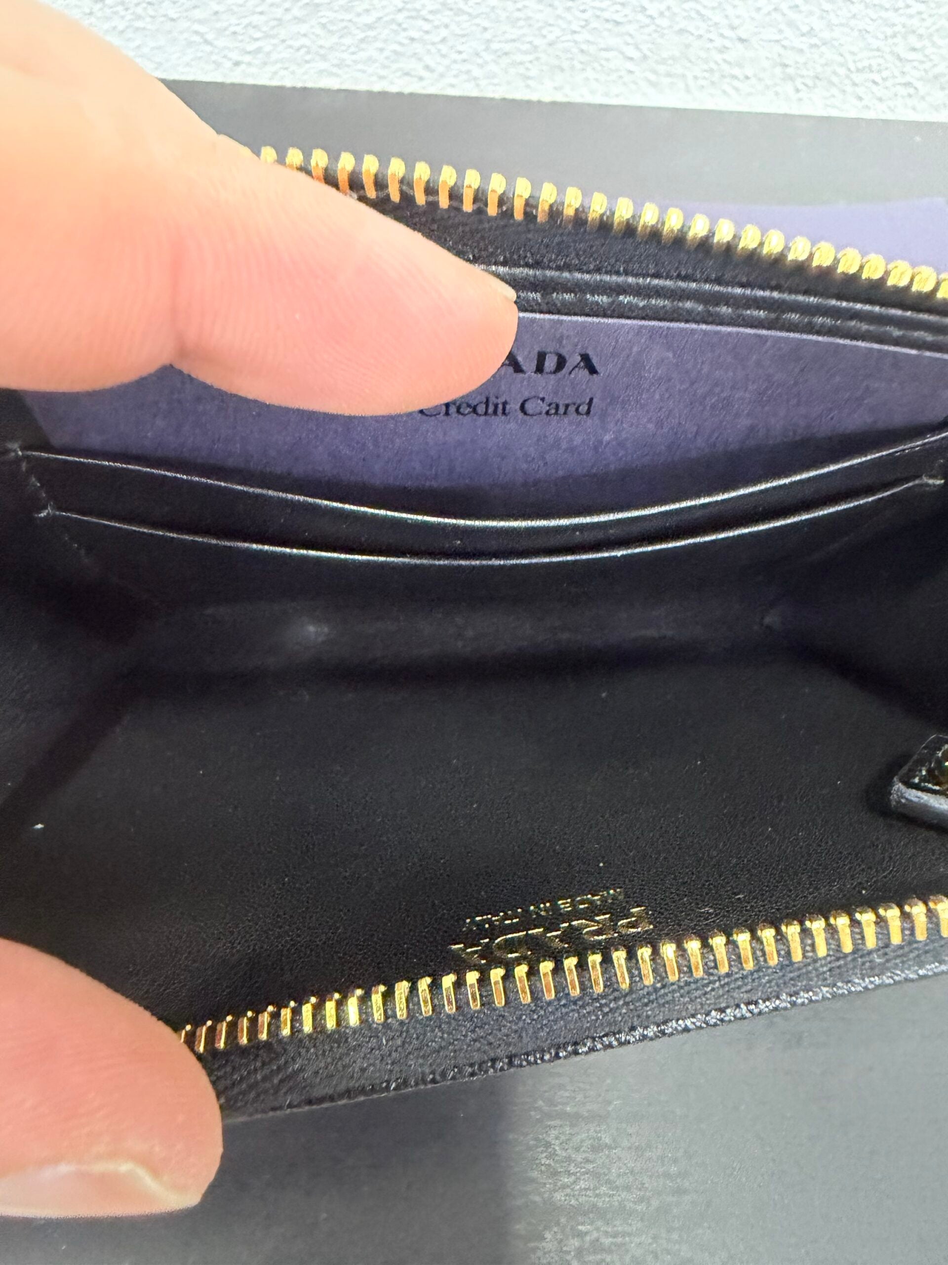 Prada Portamonete con gancio Saffiano